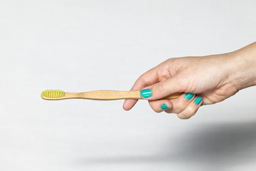 Bamboo Toothbrush in a hand