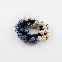 isolated of luxury woman crystal and pearl decoration hair band, crystal hair tie pretty beautiful hairdo fashion accessory for girl or woman and lady blue and white color