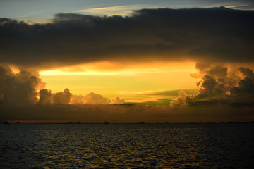 Sunset background and sun beam on the open seaGold sunset light on the ocean.Nice golden sunset at...
