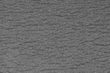 abstract rough gray surface background. Similar to asphalt, concrete, plastic. Gray matte texture of the cells.