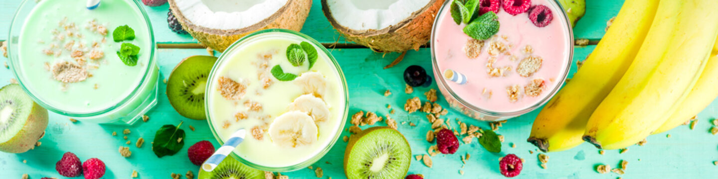 Summer Refreshing Drinks - Protein Shakes, Milkshakes Or Smoothies, With Fresh Berry And Fruits, Light Blue Table Copy Space