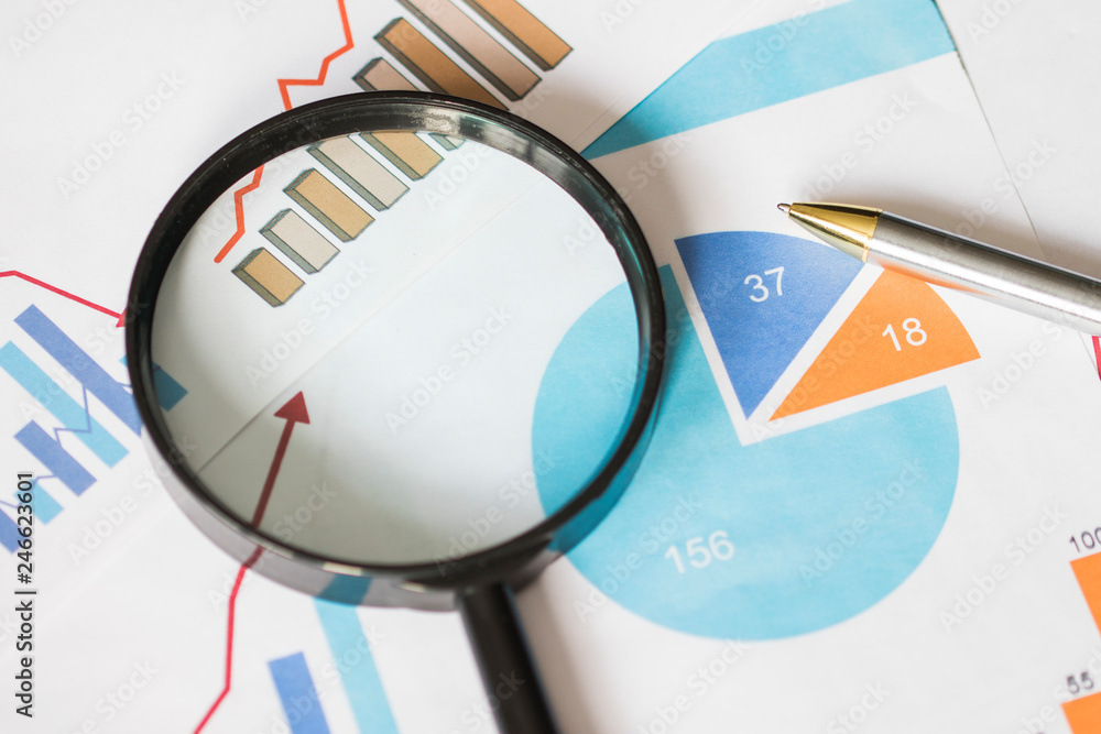 Poster analyzing and gathering statistical data. growth charts. many business reports and magnifying glass.