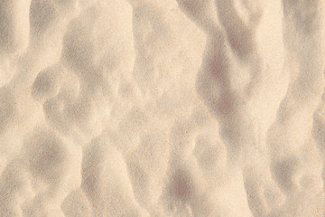 Fototapeta na wymiar White beach sand photo texture. Tropic sea coast top view. Natural soft sand beach texture. Dry sand surface