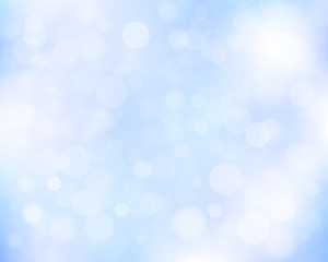 Obraz premium Light blue abstract bokeh background.