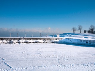 Fototapeta na wymiar Frozen Lake Michigan covered in ice and snow during the polar vortex, Chicago, Illinois