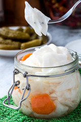 Fermented cabbage in a jar closeup.