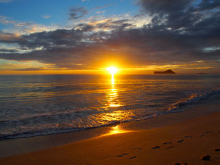 Early Morning Sunrise on Waimanalo Beach over ocean