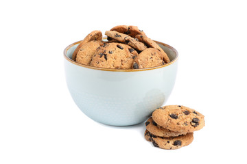 Bowl with tasty chocolate chip cookies on white background