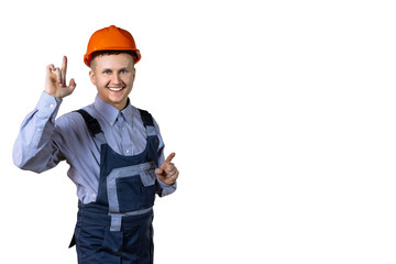 Builder in an orange helmet rejoices and dances. Isolated