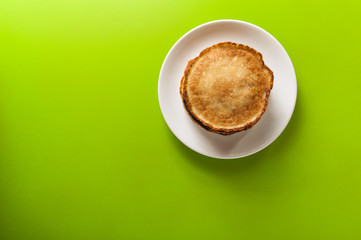 pancakes on green on plate