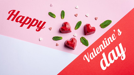 Greeting card with Valentine's Day. Handmade chocolate sweets pastry with strawberry filling, on a...