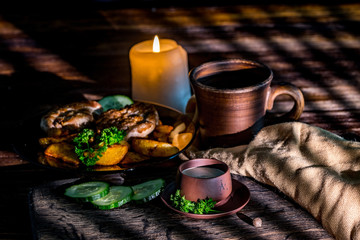 Grilled steak with french fries sauce and greens with pepper and cucumber