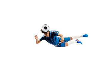 Young boy with soccer ball doing flying kick, isolated on white. football soccer players in motion on studio background. Fit jumping boy in action, jump, movement at game.