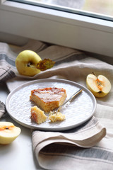 Upside Down Apple Cake, on light grey plate
