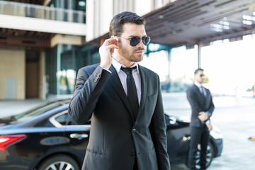 Protection Officer Wearing Suit On Street