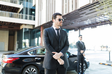Alert Bodyguards Doing Their Duties Escorting Client