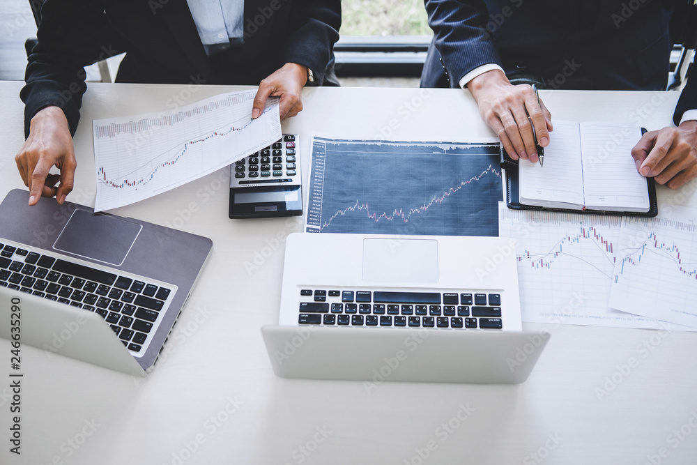 Poster Business team investment working with computer and analysis graph stock market trading with stock chart data, business and technology concept