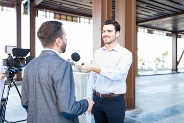 TV Reporters Recording Speech Of President