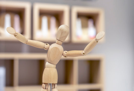 Wooden doll of a gestalta with various poses.