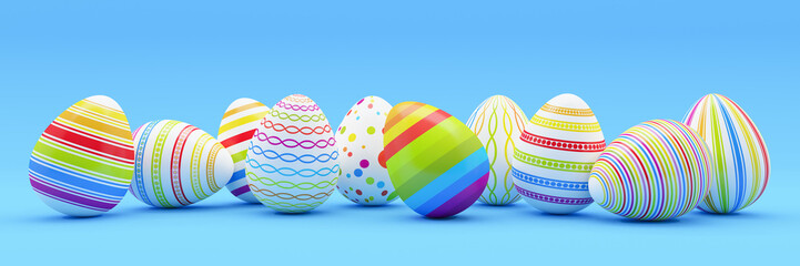 Frohe Ostern - 10 farbenfrohe, bemalte Ostereier auf blauen Hintergrund - Textfreiraum - Oster