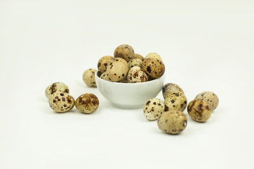 Fototapeta premium quail eggs on a light background