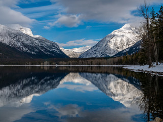 Fototapeta na wymiar Mount Cannon and Mount Vaught in Full Reflection on Lake McDonald