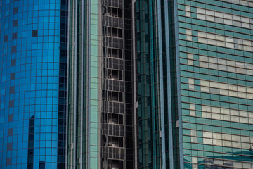 Fototapeta na wymiar skyscraper windows, multistory building