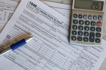 Tax Forms calculator pen paper finance business 