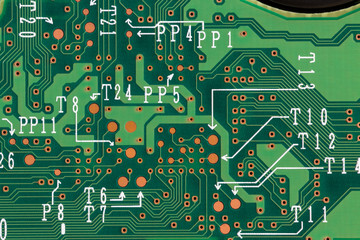 Closeup of green printed computer circuit boards. Top view.