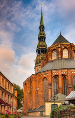 Medieval church of Saint Peter in old district of Riga - the capital and largest city of Latvia, a major commercial, cultural, historical and tourist center of the Baltic region