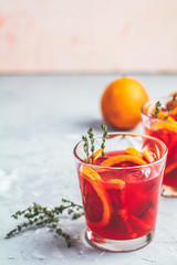 Blood Orange Margarita cocktail with ice and thyme