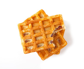 Traditional Belgian waffles, isolated on a white background, top view.
