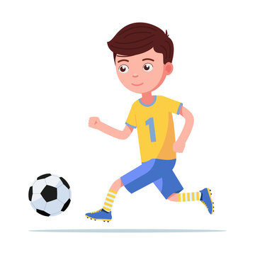 Boy football player in sportswear runs for ball