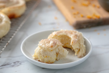 Freshly Baked Homemade Orange Rolls on Kitchen Counter
