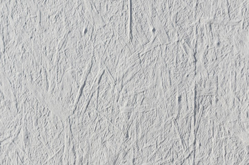 Texture of paper poster glued to the plywood board