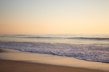 Calm sea with colorful sunset
