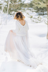Fototapeta na wymiar woman stylish lush dress woods winter