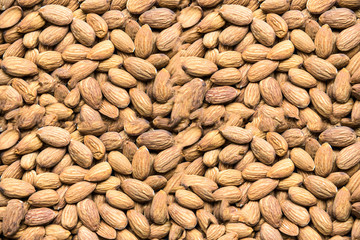 Roasted peeled almond nuts texture ,top view. Almond nuts background