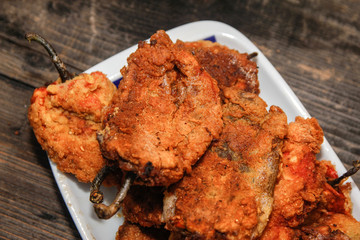 Roasted breaded paprika on white ceramic plate
