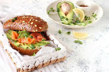 Sandwich with cream cheese avocado and salmon