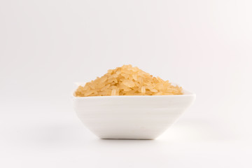 white rice in bowl isolated on white background