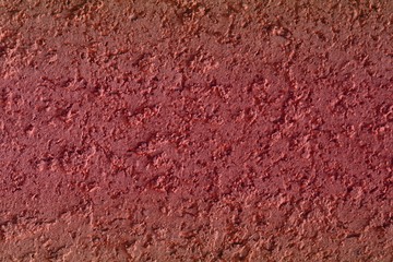 pretty vintage red limestone like stucco texture for use as background.