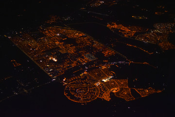 Night city Cairo from the height of the aircraft, lighting the city