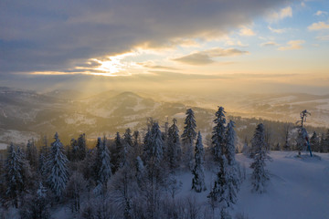 Winter scenery in Silesian Beskids mountains. View from above. Landscape photo captured with drone. Poland, Europe.