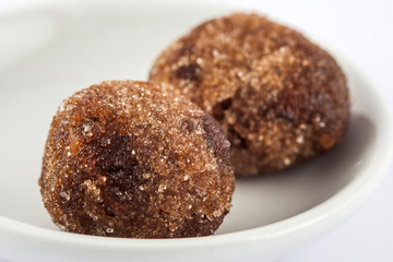 Tamarind balls a traditional sweet from Cartagena de indias  on white ceramic dish
