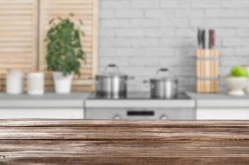 Modern kitchen interior with new furniture and different utensils