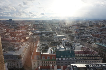 View of winter Vienna from the tower of St. Stephen’s Cathedral. City in a haze.