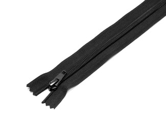 Obraz premium Closed black zipper isolated on white background. Black zipper for tailor sewing.