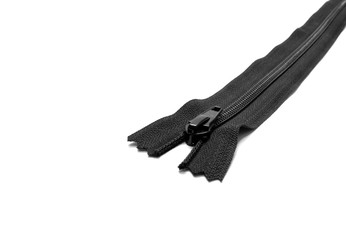 Closed black zipper isolated on white background. Black zipper for tailor sewing.