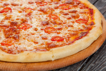  appetizing, fresh pizza on the table, for a design decoration in cooking